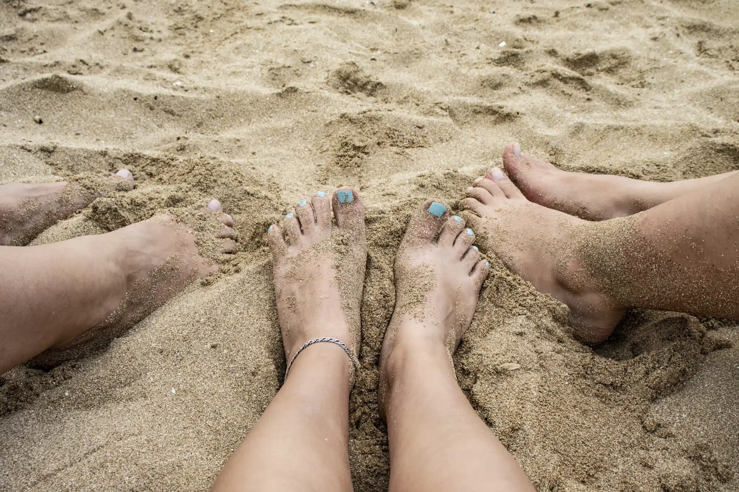 zand van huid verwijderen